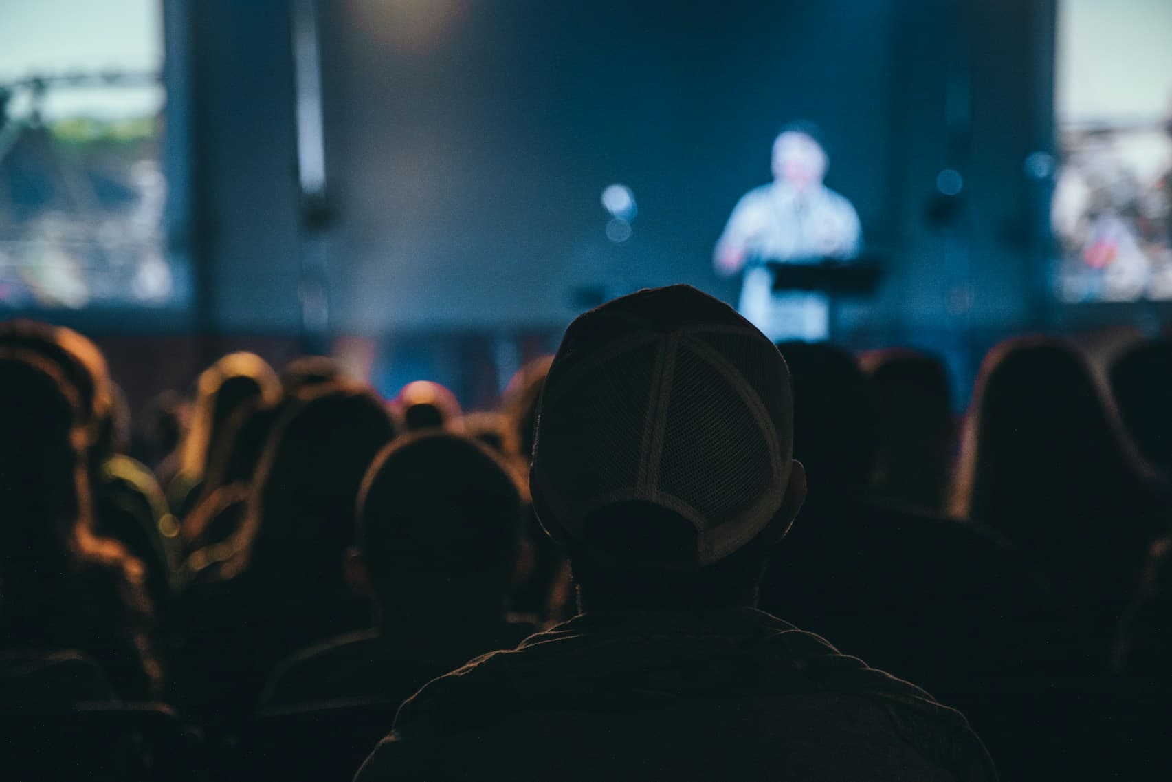 Audience watching a presentation at an industry event